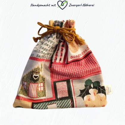 Geschenksackerl Happy Holiday personalisierbar Weihnachtssackerl Feiertage aus Stoff geschlossen handmade für Babys und Kinder